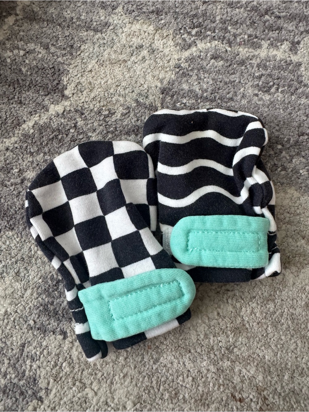 Lovevery black and white mittens